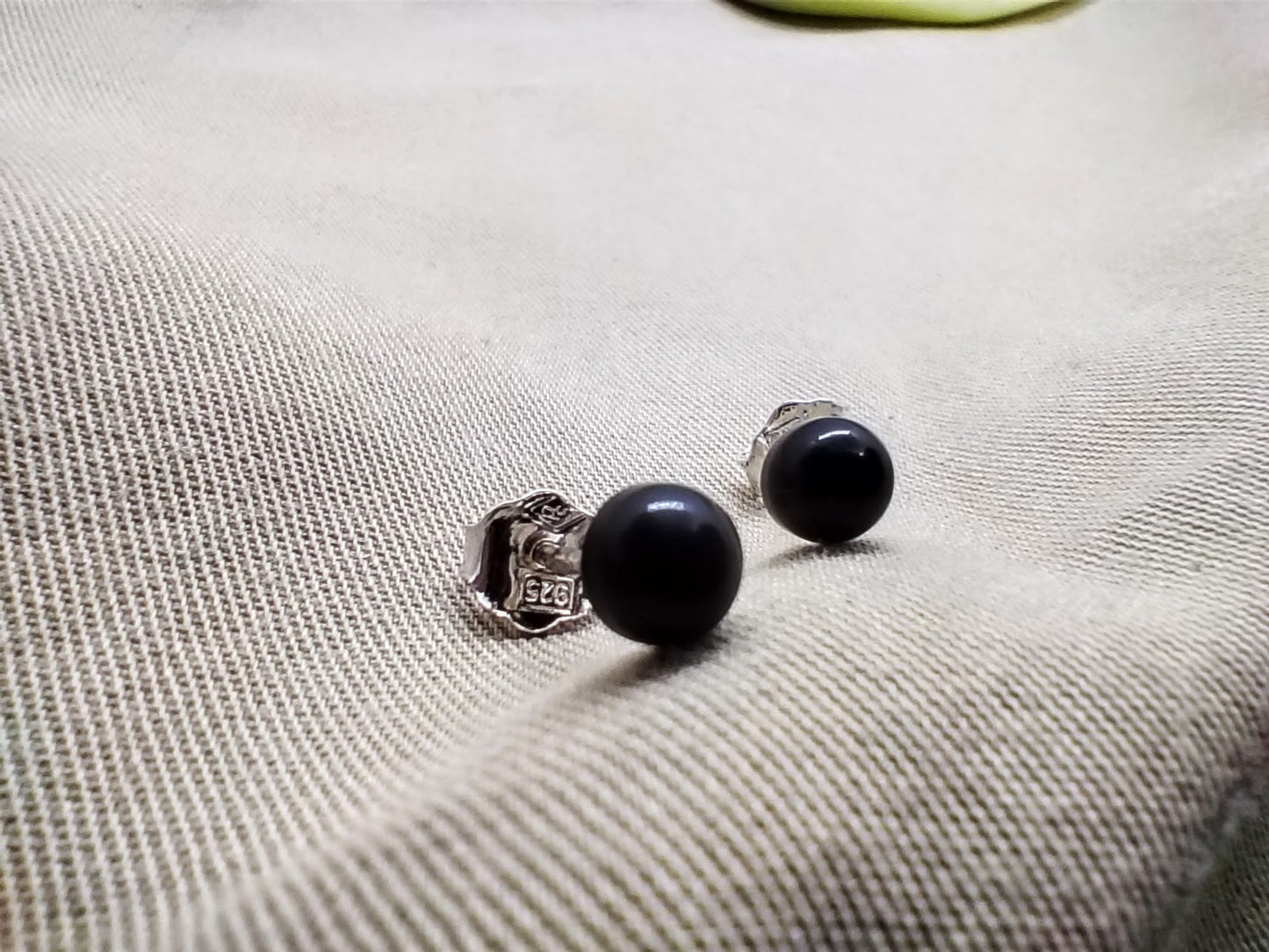 Sidabriniai auskarai su Oniksu